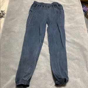 Super cute joggers with distressed pockets.